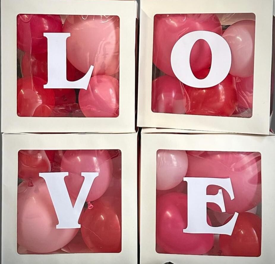 A Bunch of Colourful Balloons and a Blue Pump — Yeppoon Balloons & Party Supplies in Yeppoon, QLD