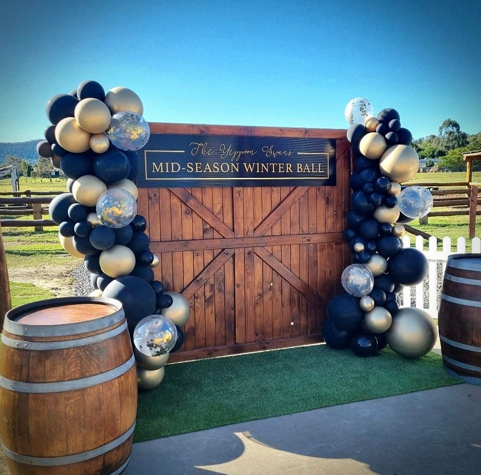 A Wooden Sign That Says Mid-Season Winter Ball - Yeppoon Balloons & Party Supplies in Yeppoon, Qld