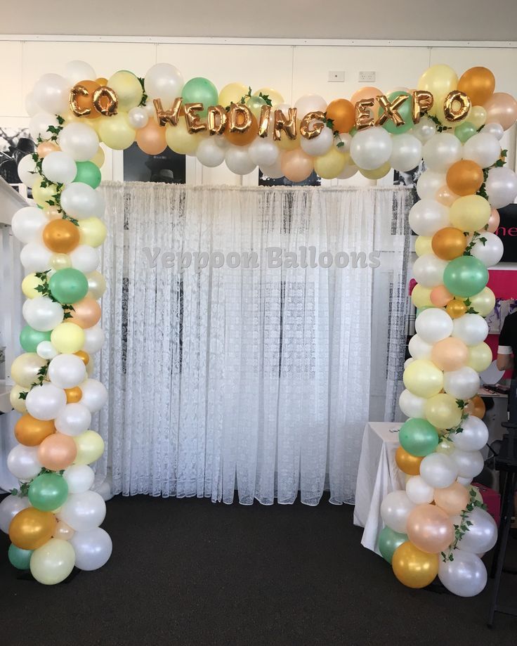 A Balloon Arch With a Sign That Says Wedding Expo - Yeppoon Balloons & Party Supplies in Yeppoon, Qld