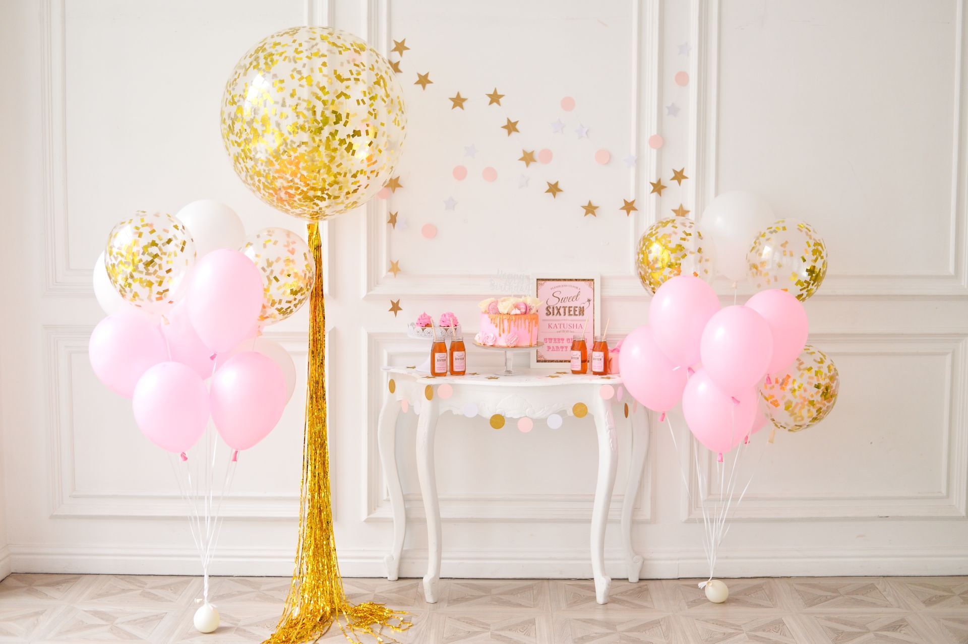 A Room Decorated With Pink and Gold Balloons and a Table - Yeppoon Balloons & Party Supplies in Yeppoon, Qld