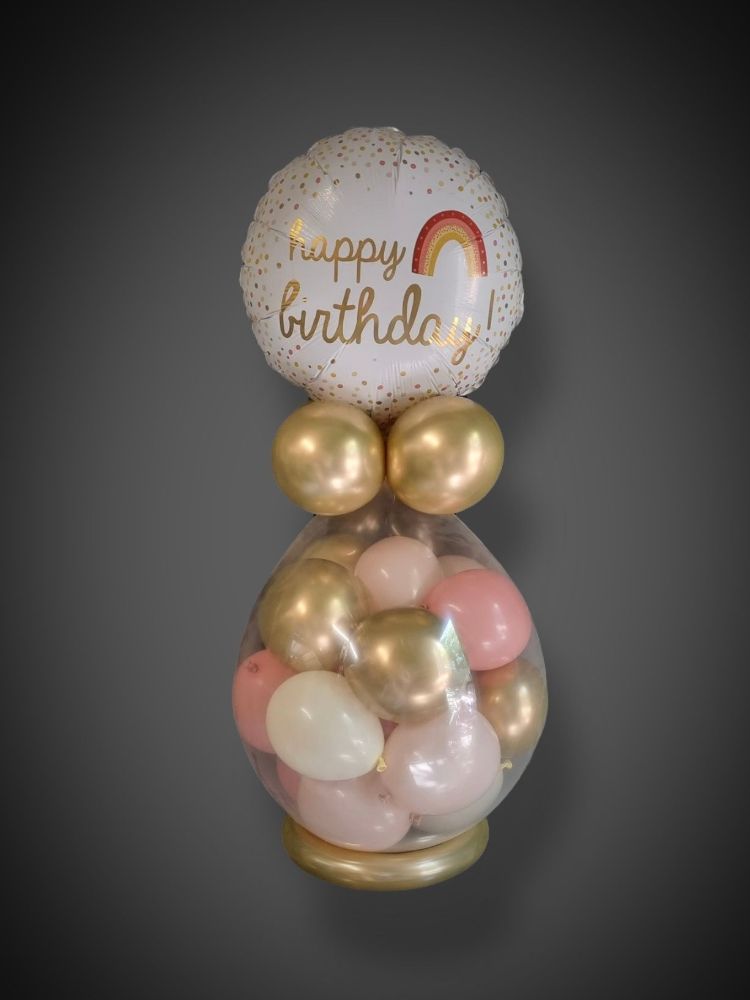 Pinata balloon with a happy birthday balloon attached