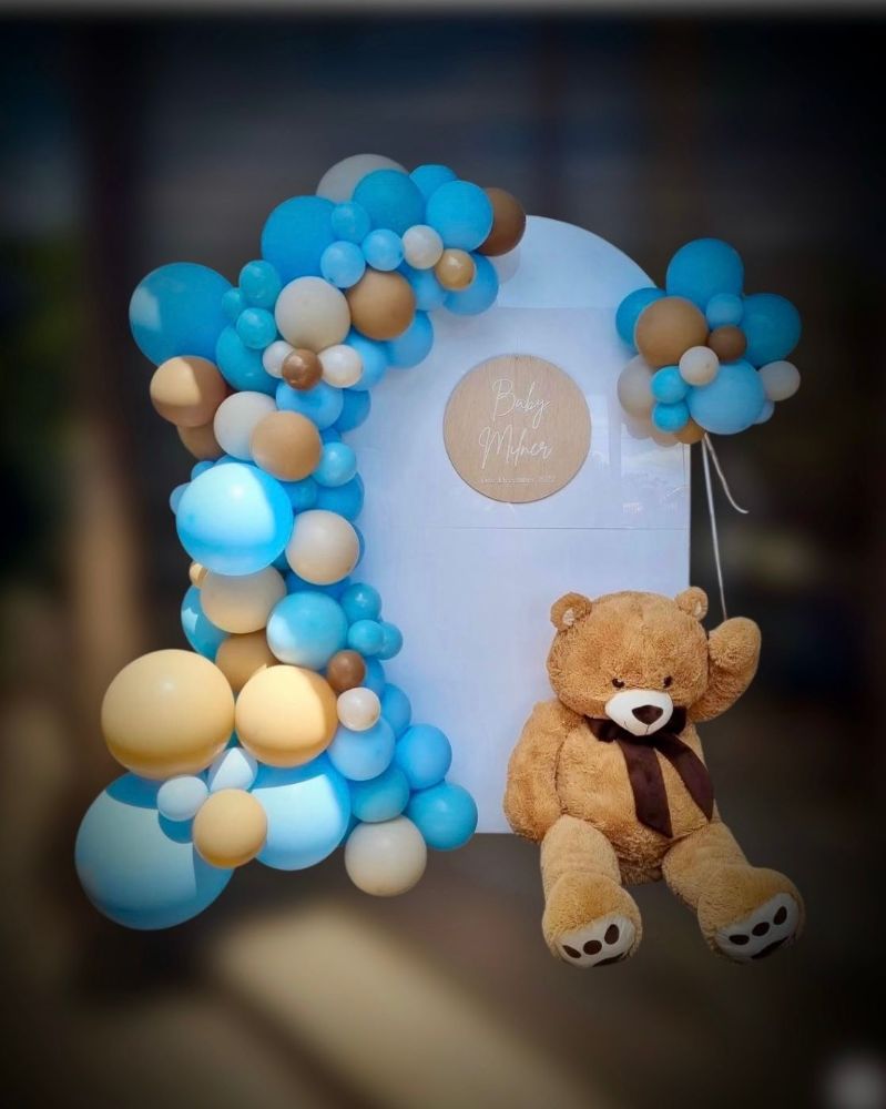 Acrylic arch with balloons attached