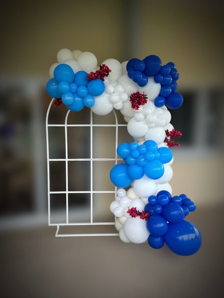 A Balloon Arch With Blue and White Balloons and Red Flowers - Yeppoon Balloons & Party Supplies in Yeppoon, Qld