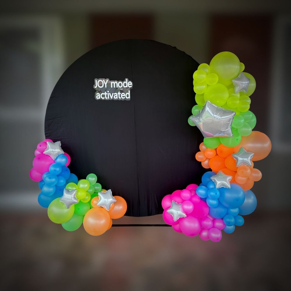A Black Circle Surrounded by Colorful Balloons With the Words “Joy Mode Activated ‘’ Written on It - Yeppoon Balloons & Party Supplies in Yeppoon, Qld