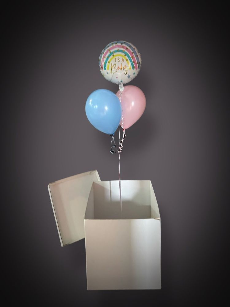 A balloon box with balloons floating out