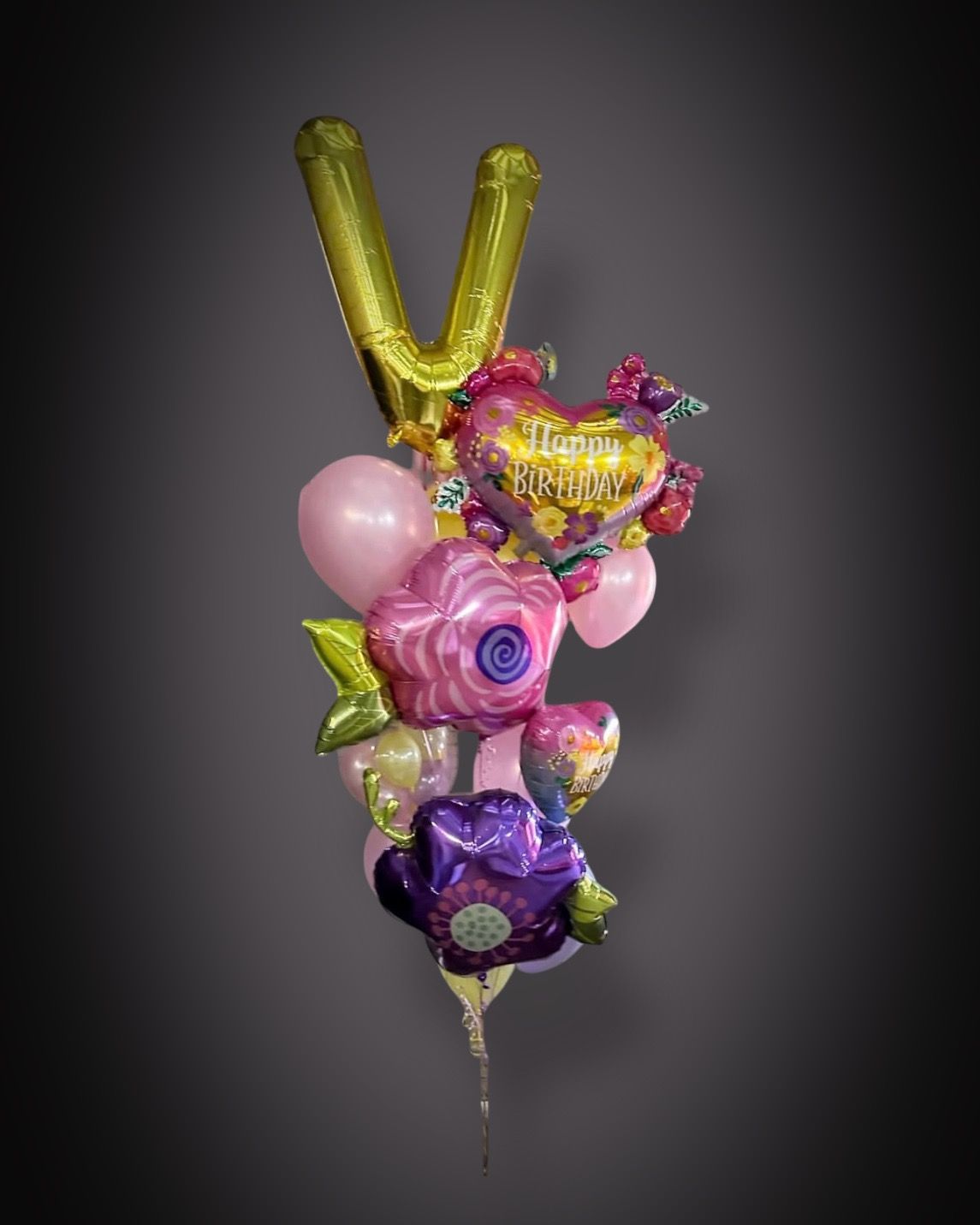 A bundle of balloons Helium filled mixed bouquets