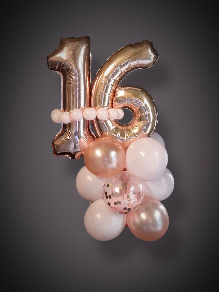 Mini columns made out of balloons with the number 16