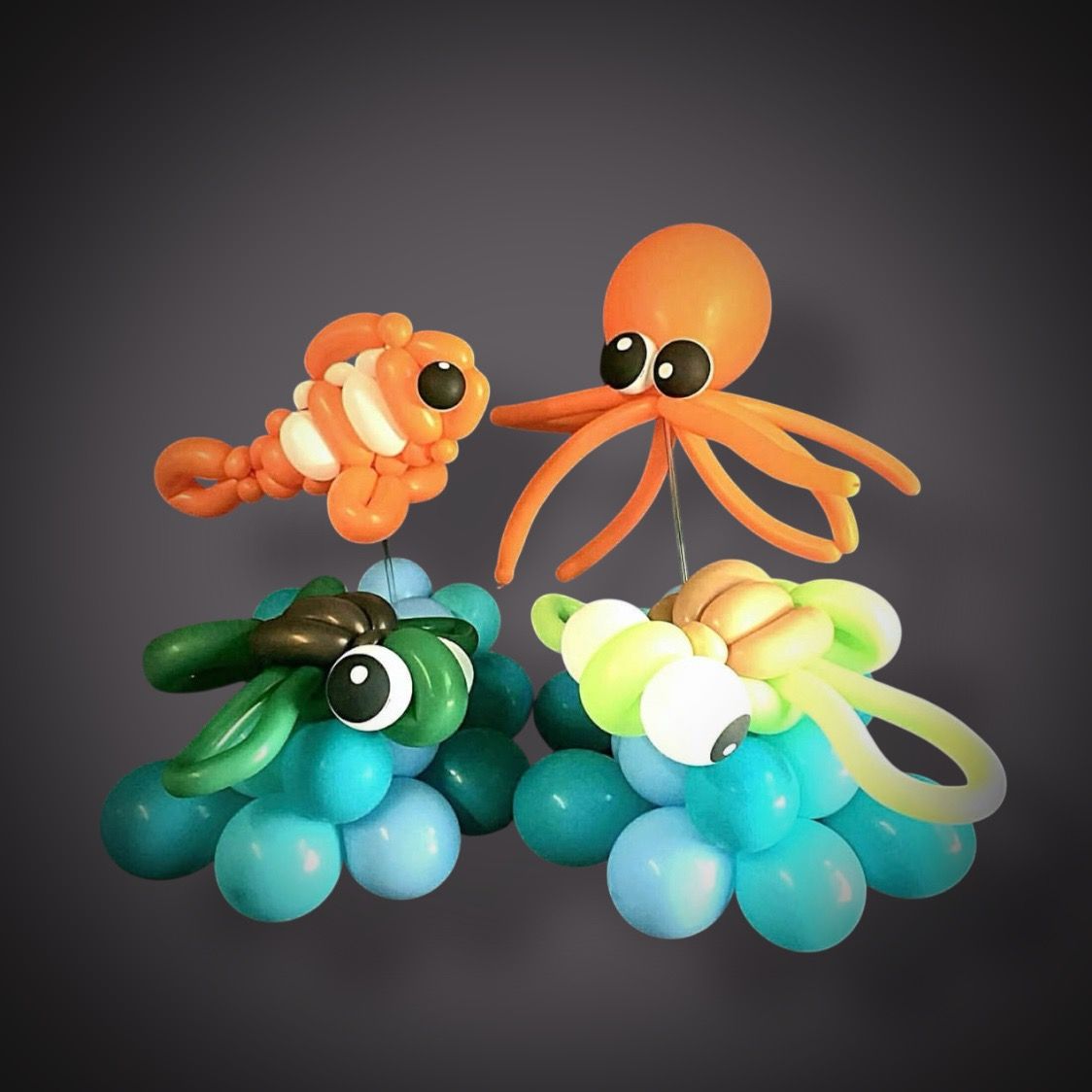 Balloon twisting done in the shape of marine animals