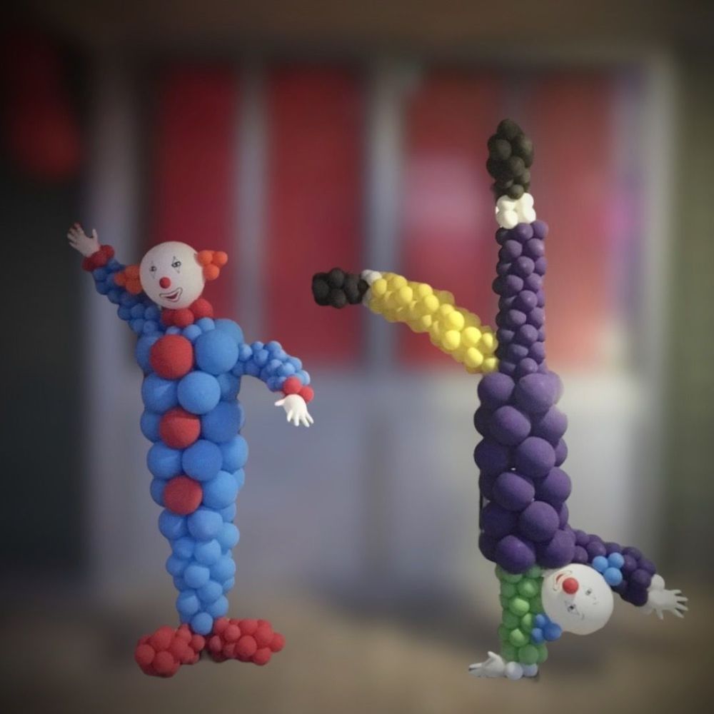 Two Clowns Made Out of Balloons Are Doing a Handstand - Yeppoon Balloons & Party Supplies in Yeppoon, Qld