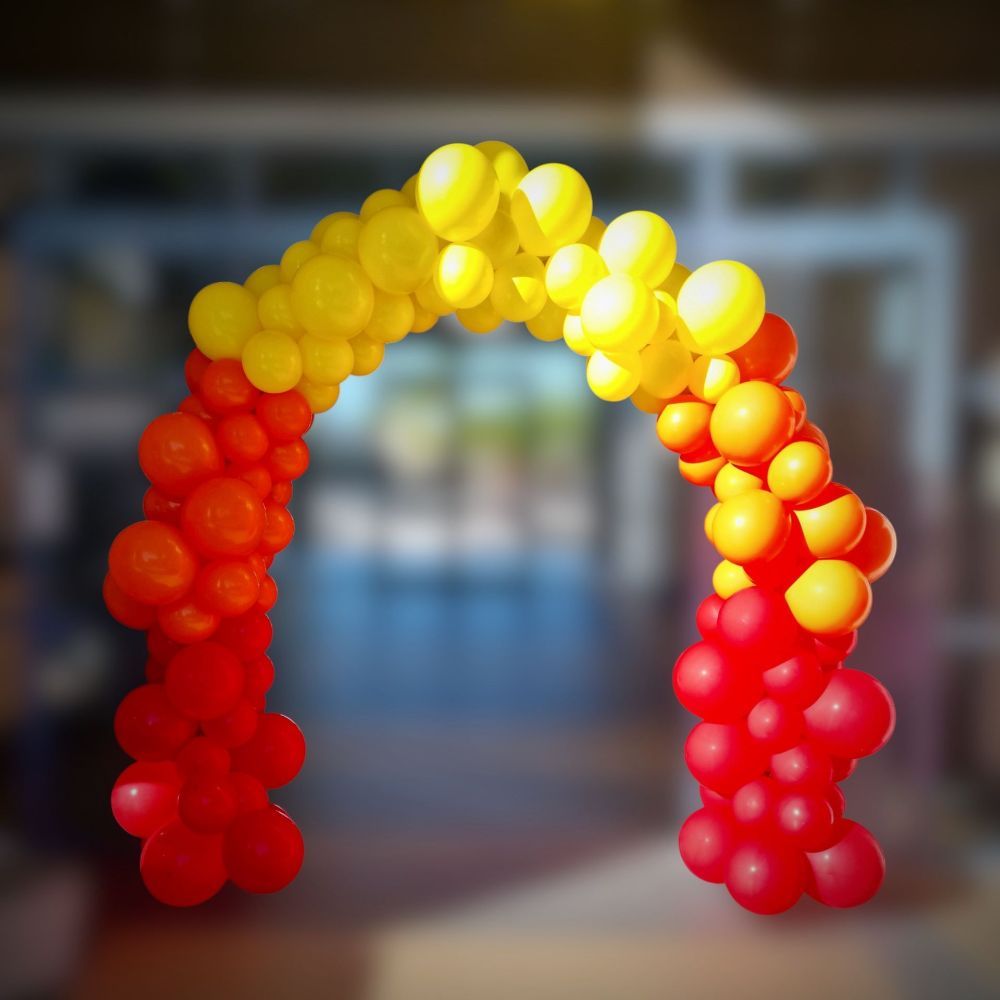 an Organic arch made out of balloons