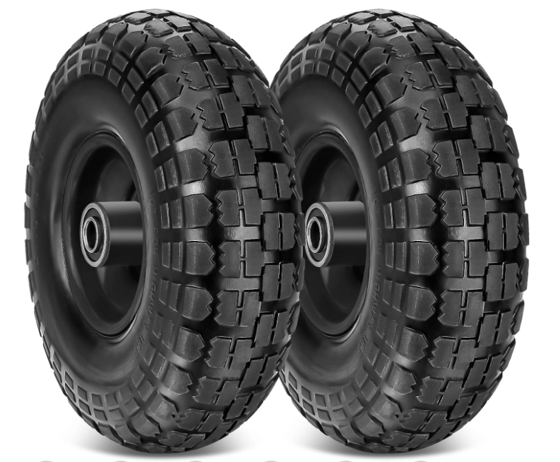 Two black, knobby-treaded tires side-by-side.