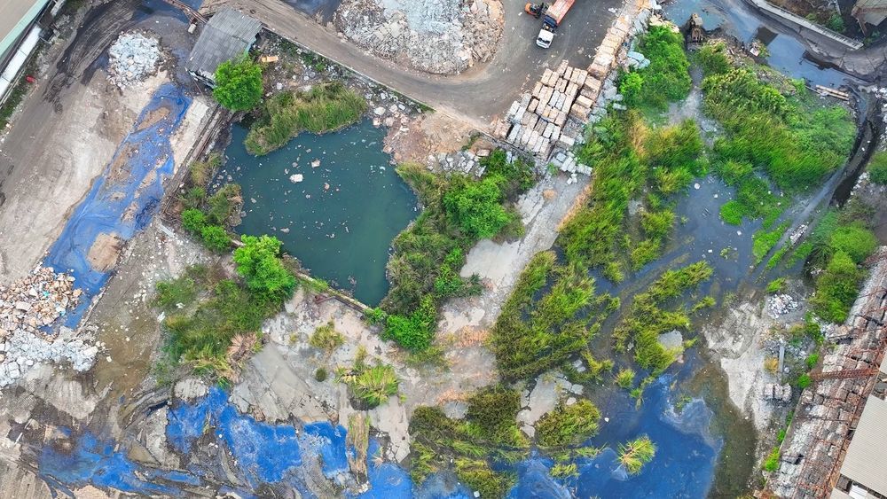 Environmental remediation concept showing industrial wastewater pollution with chemicals, heavy metals, and toxins threatening ecosystems and human health