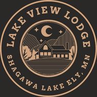 the logo for lake view lodge shows a house in the middle of a circle with mountains in the background .