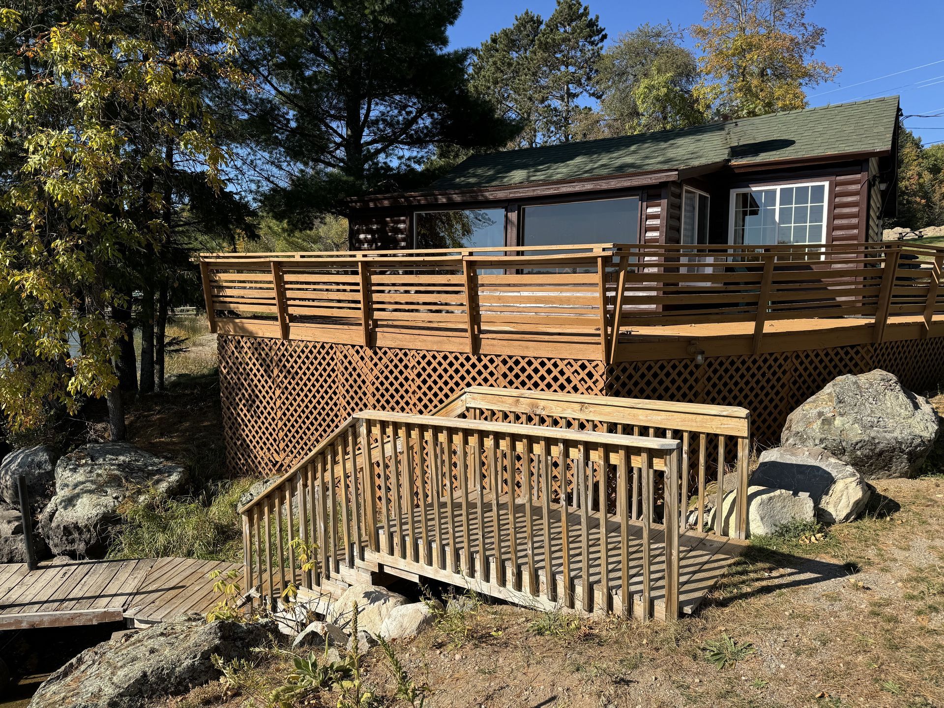 there is a chair in the corner of the room next to the door .