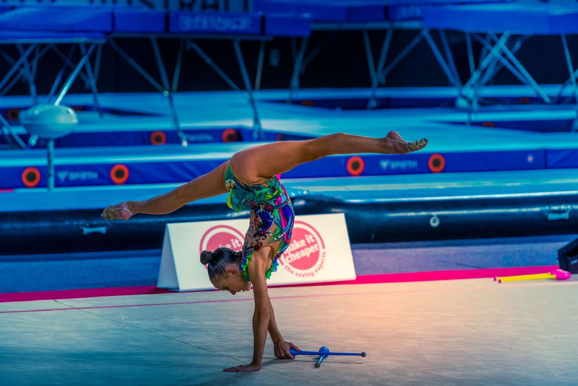 A woman wearing a purple shirt with the name tania on it