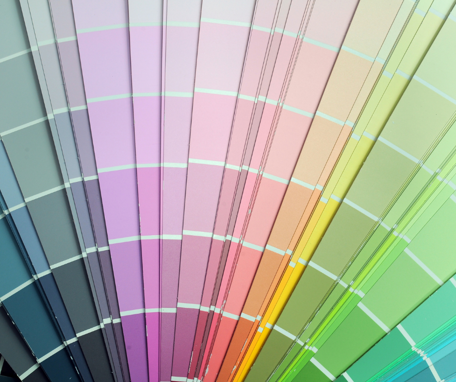 A fan shaped display of different colors of paint