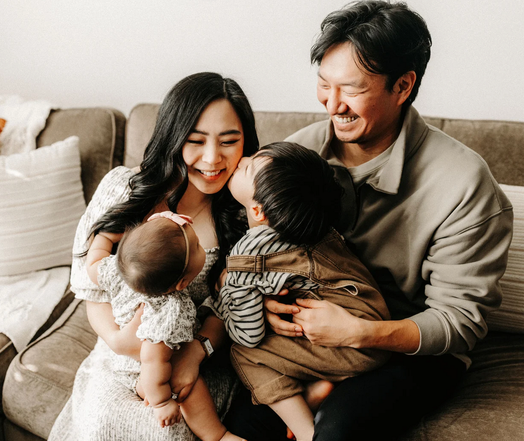 Happy family enjoying their new home financed through The Sharpe Mortgage Team