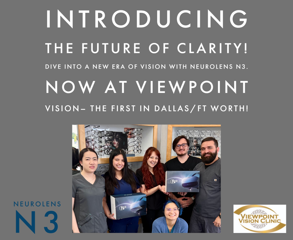 A group of people are standing in front of a sign that says introducing the future of clarity