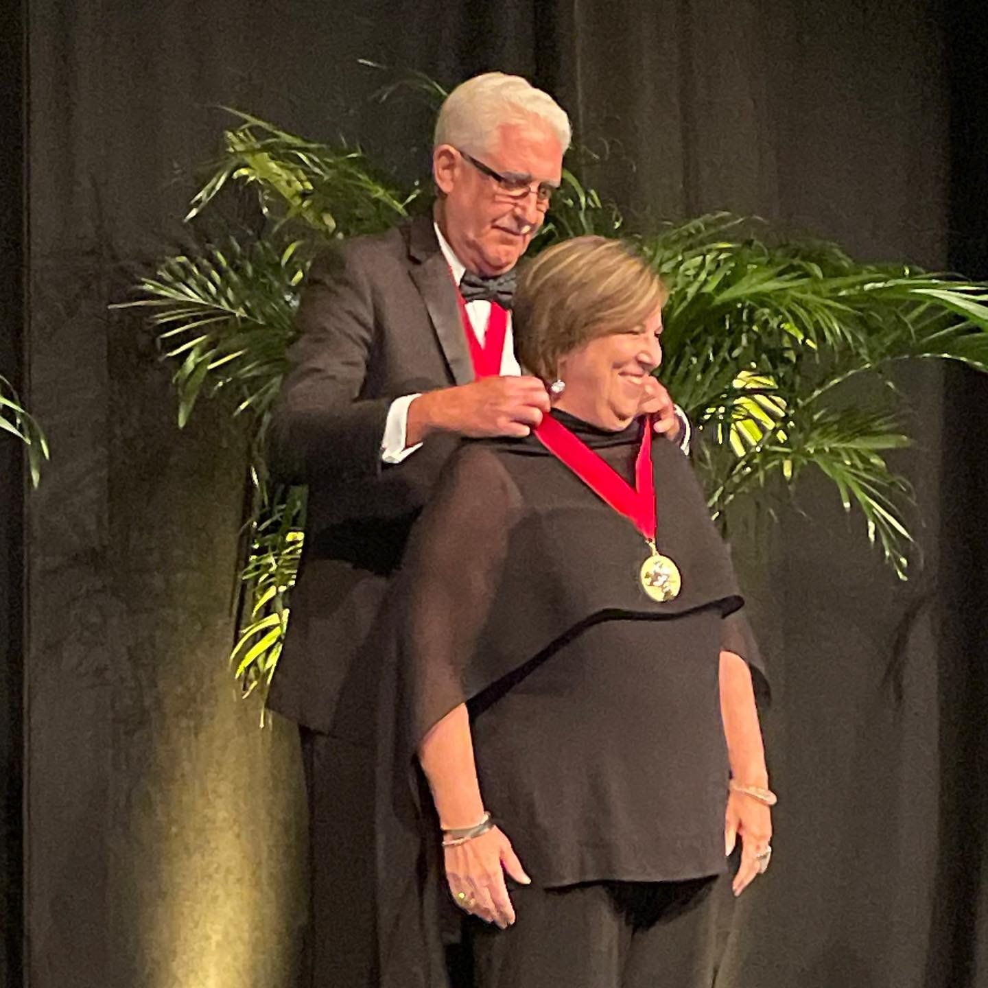 Gold Medal Laureate, Rick Logan FAIA presents Joyce Owens FAIA, RIBA with the AIA Florida Gold Medal.