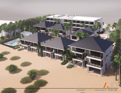 An aerial view of a building with a pool in the middle of it