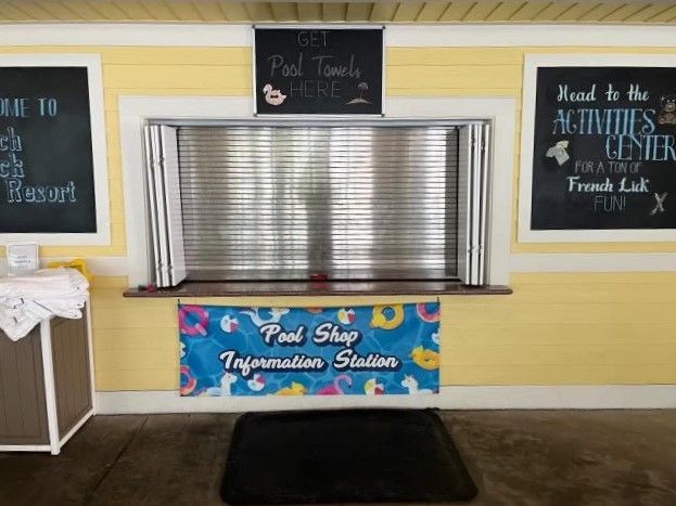 A pool shop with a sign that says pool shop information station