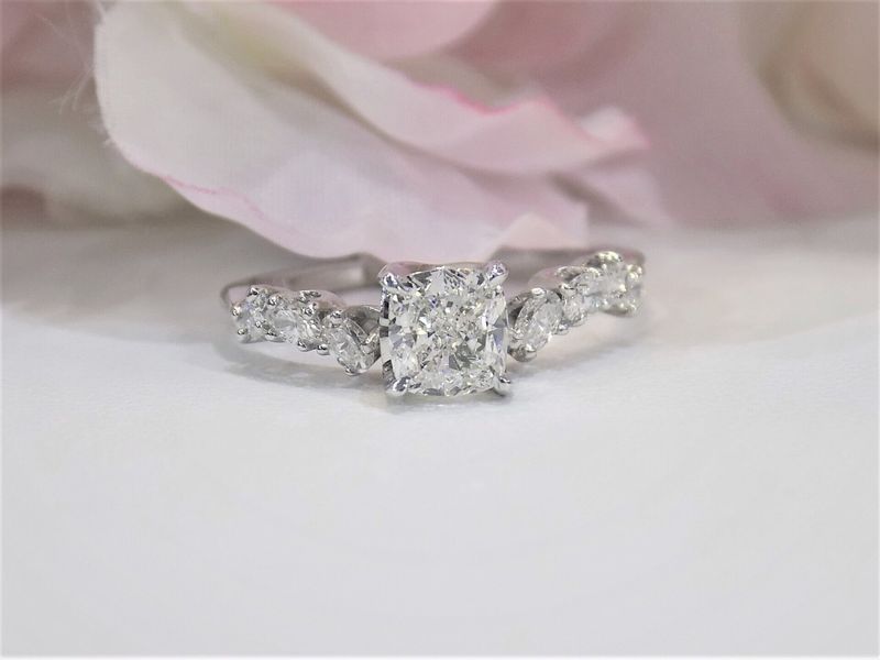 Diamond ring with a square center stone