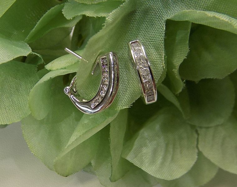 Silver hoop earrings set with small