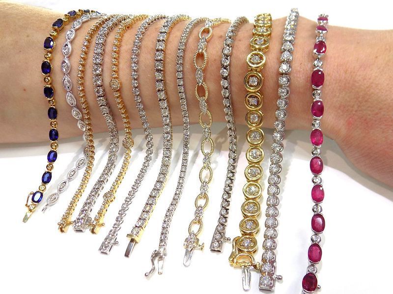 Close-up of a wrist displaying multiple diamond