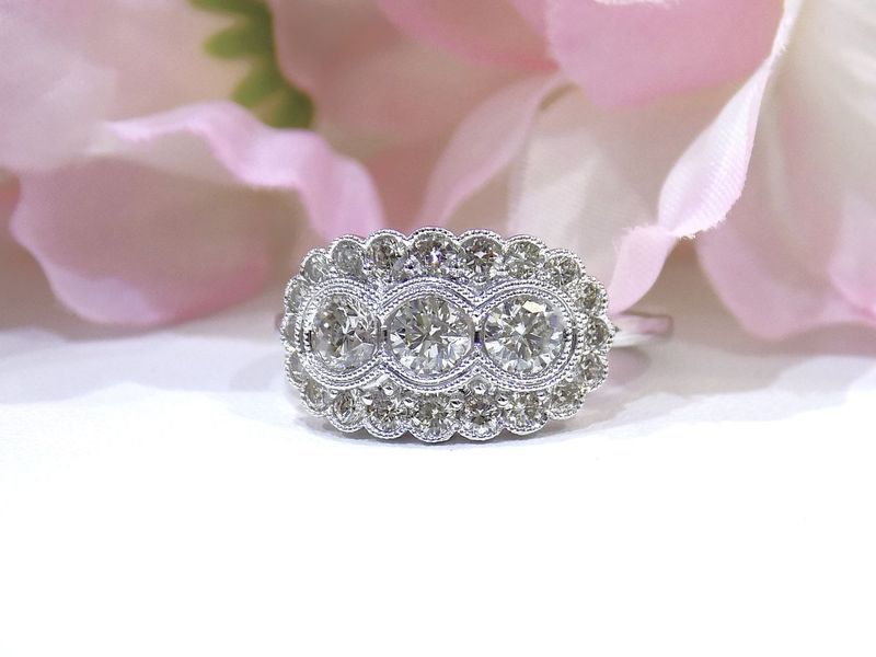 Diamond ring with three center stones