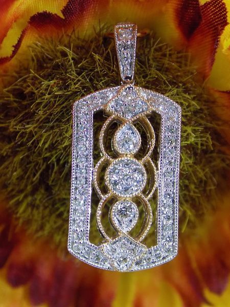 Diamond pendant with gold accents