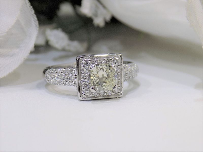 Diamond engagement ring with square halo setting