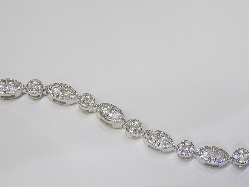 Diamond bracelet on white surface