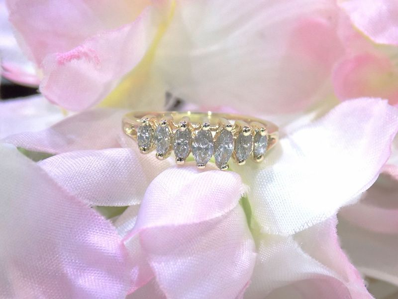 Gold ring with marquise-cut diamonds