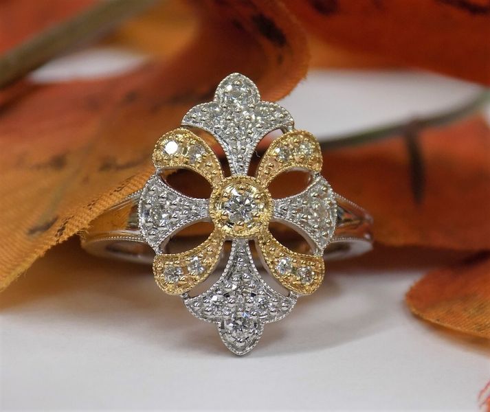 Diamond ring with yellow and white gold flower design