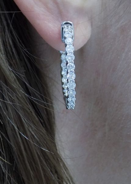 Woman wearing hoop earrings