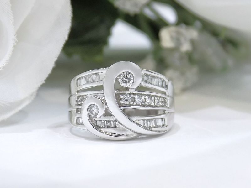 Silver ring with baguette and round diamonds