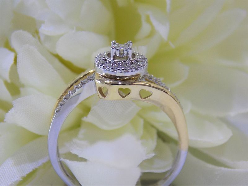 Diamond engagement ring with gold and silver band