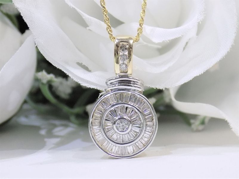 Diamond pendant on a gold chain