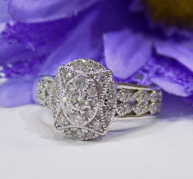 Diamond ring with cluster of diamonds