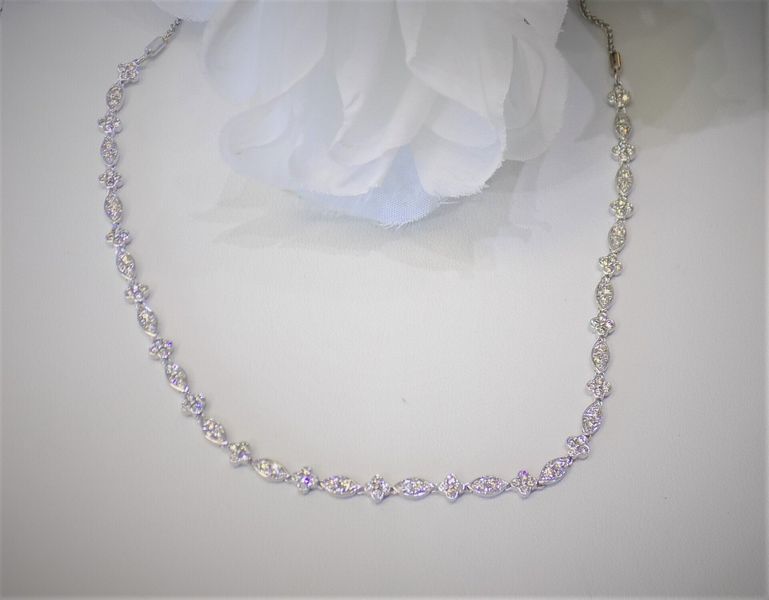 Delicate silver necklace with small