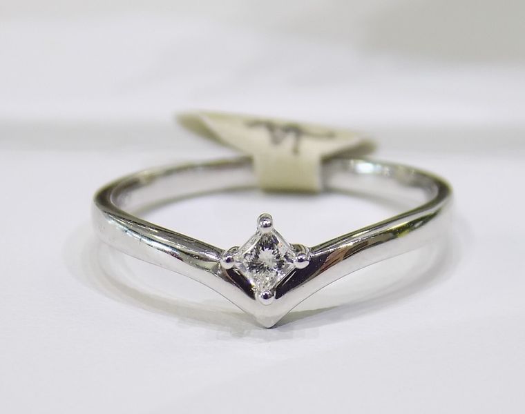 Silver ring with a small