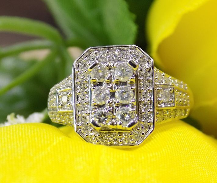 Diamond ring with multiple small stones set in yellow gold