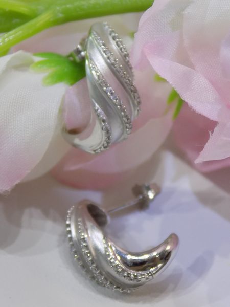 Silver hoop earrings with small crystals