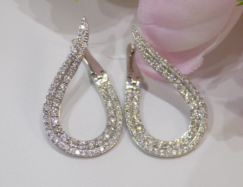 Pair of silver teardrop-shaped earrings