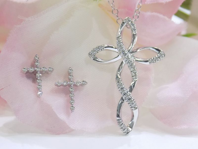 Diamond cross pendant necklace and earrings