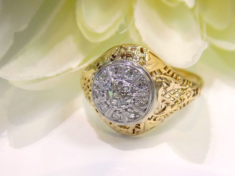 Gold ring with cluster of diamonds