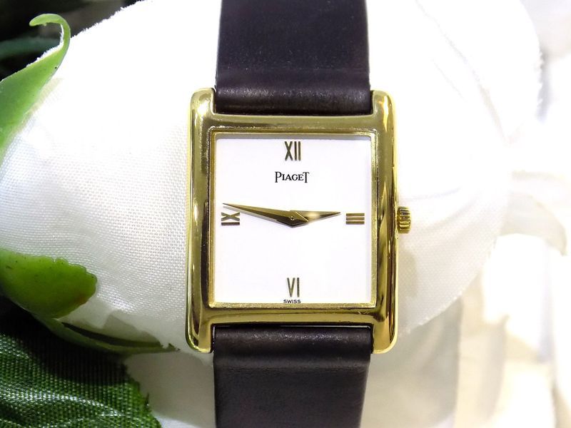 Gold rectangular piaget watch