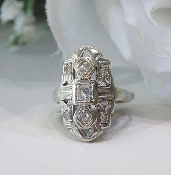 Art Deco diamond ring on white surface