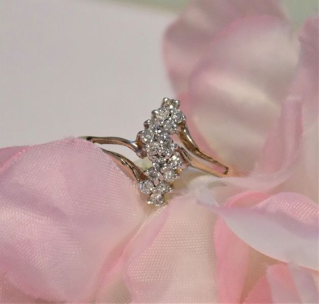 Diamond ring set on pink petals