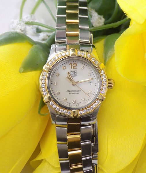 Gold and silver tag heuer watch